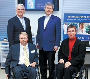 B.C. Premier Gordon Campbell, Prime Minister Stephen Harper, RHI Board Chair Daryl Rock and Rick Hansen touring the Blusson Spinal Cord Centre during the official launch of the 25th anniversary of the Man in Motion world tour.