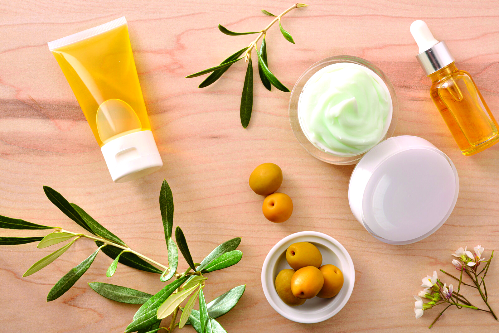 skincare products, olives and rosemary